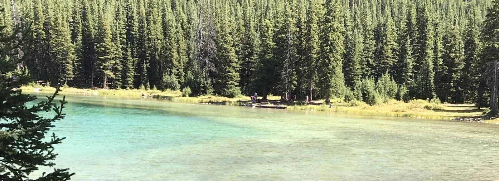 About Adventures With Meaning. A great depiction of Emerald Lake with guests having lunch