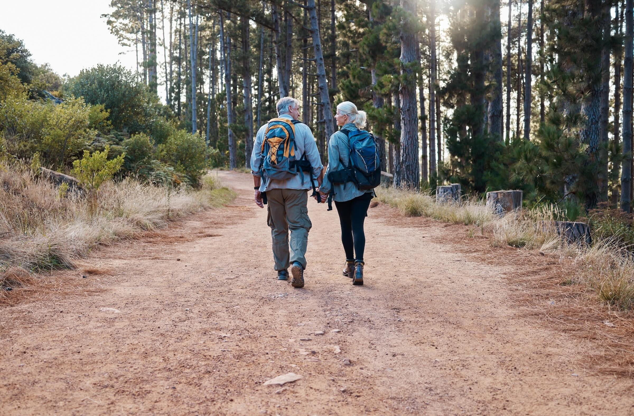 Active adults over 50 enjoying a guided hike in the Canadian Rockies