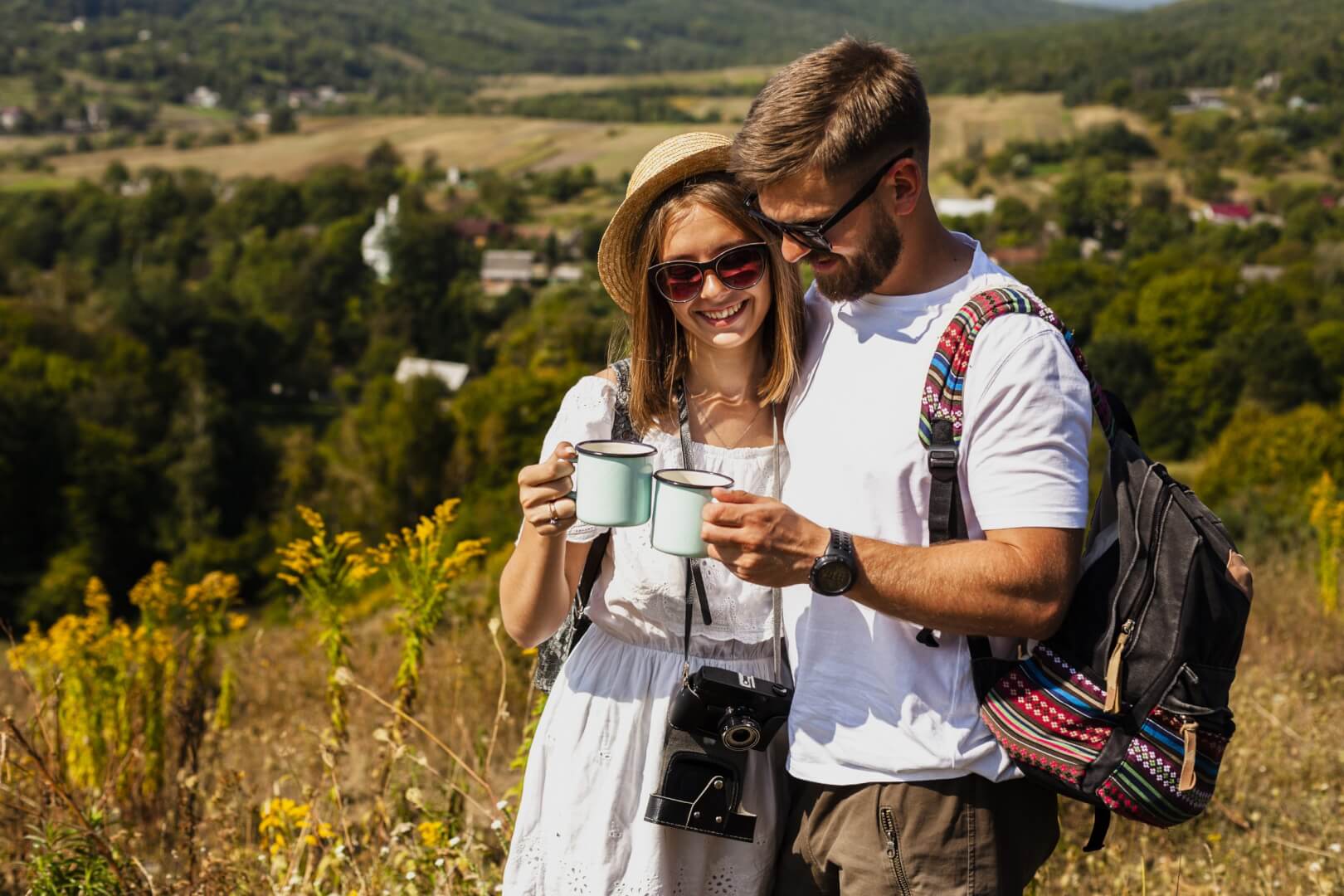 Couple toasting after planning the best months for a Canadian Rockies trip