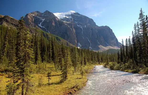 Grassi Lakes in Kananaskis with turquoise water and limestone cliffs